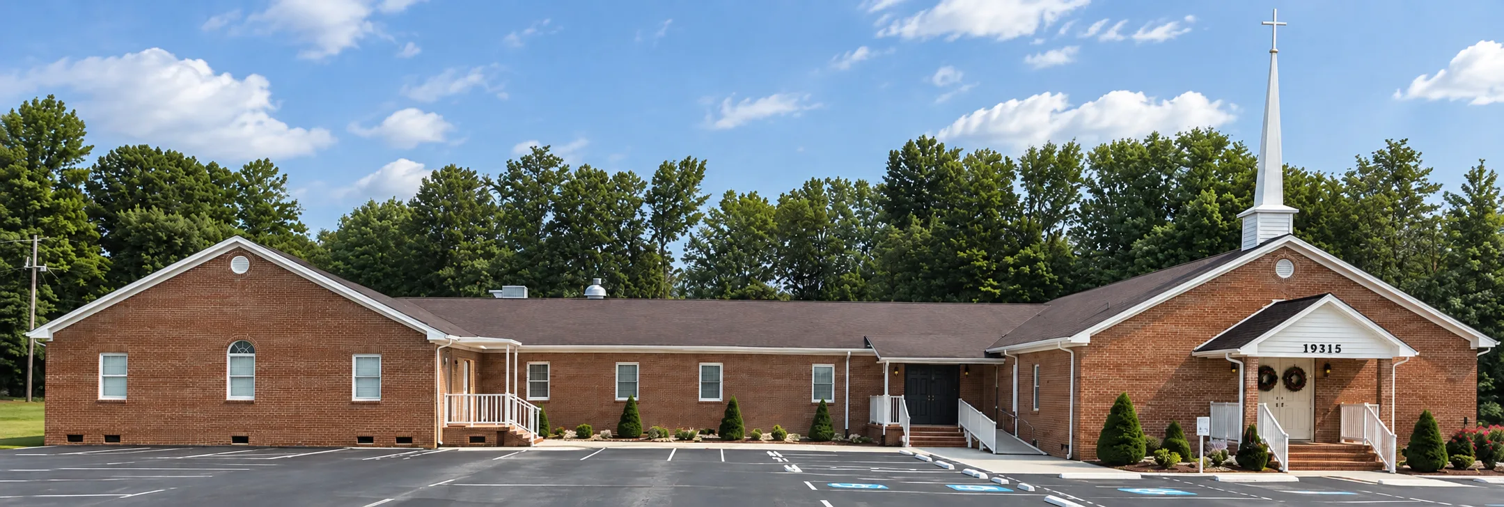 Community Fellowship Church of Deliverance church building with its white steeple